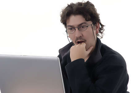 young man working with computer in a white background