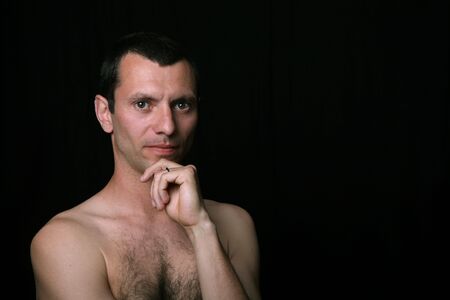 young man model on a black backgroundの写真素材