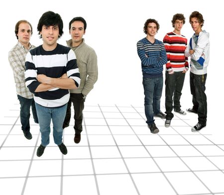 two groups of young men, studio pictureの写真素材