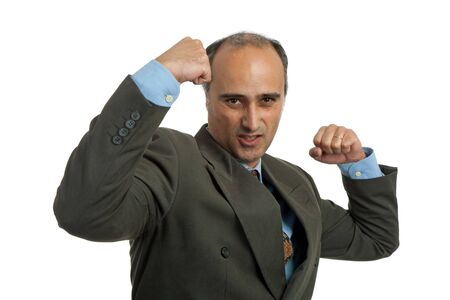 mad mature business man portrait, isolated on whiteの写真素材