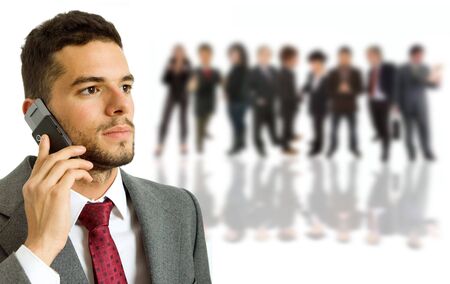 young business man with some people on the backの写真素材