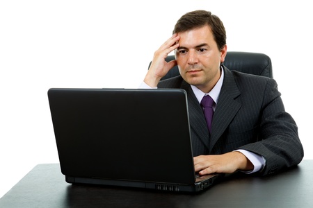 young business man working with is laptop, isolatedの写真素材
