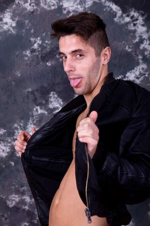 silly young casual man close up portraitの写真素材