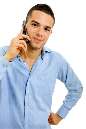 young casual man on the phone, isolated on whiteの写真素材