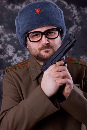 young man dressed as russian military, studio