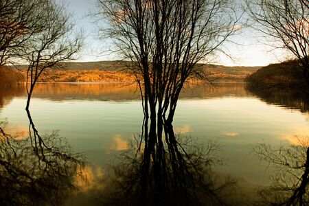 autumn flood at the lake at sunset, north of spainの写真素材