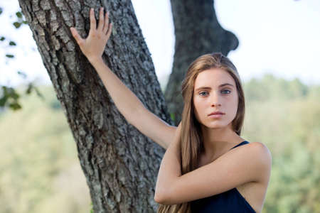 young casual beautiful girl outdoors portraitの写真素材