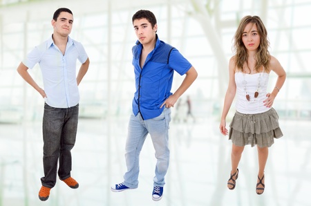 three young casual teenagers, full body pictureの写真素材