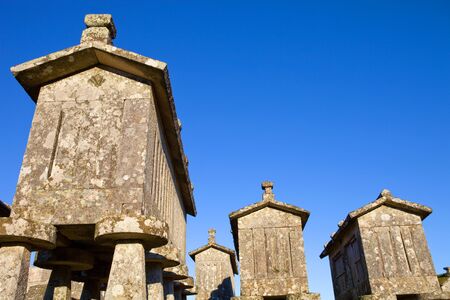 Typical stone corn driers, called Espigueiros in Lindoso, north of Portugal.の写真素材