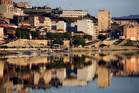 city of Peso da Regua and it's reflection on douro river