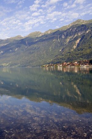 Brienz reflection at the lake in switzerlandの写真素材