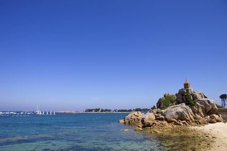 Coast of France in Brittany, the famous small chapel at the rocks in Port-Blancの写真素材
