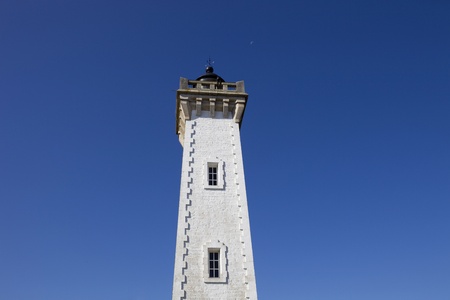 Granitic lighthouse in the harbour of Roscoff in Brittanyの写真素材