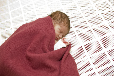 young baby sleeping, studio pictureの写真素材