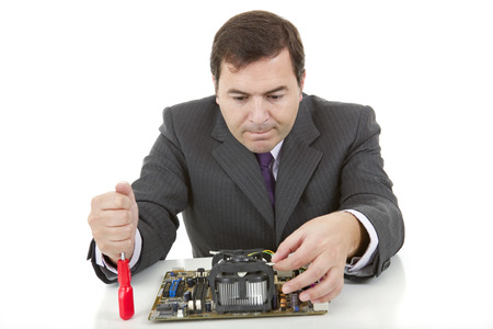 Computer engineer working in a motherboard, isolated