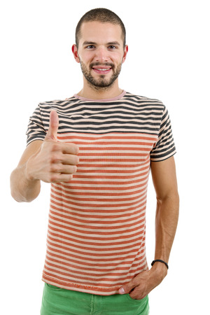 young casual man going thumb up, isolated on whiteの写真素材