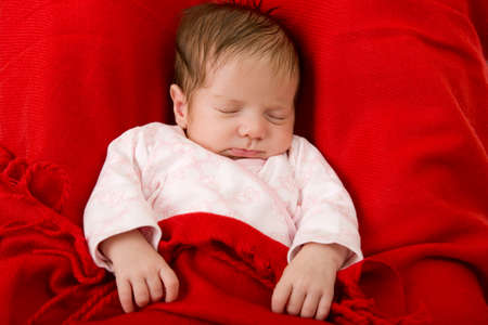 young baby sleeping, studio pictureの写真素材