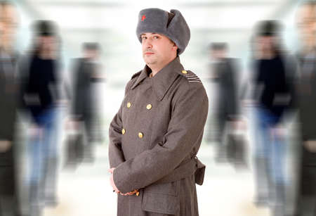 young man dressed as russian military, studio picture