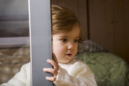 young girl portrait, at homeの写真素材