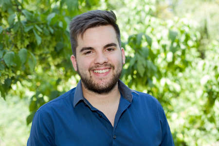 happy young casual man outdoor portrait