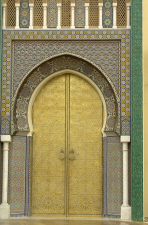 golden door detail in a mosk in Fez, in moroccoの写真素材