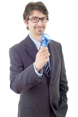 silly business man with a lamp isolated on whiteの写真素材