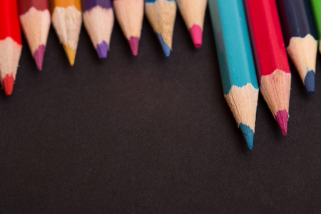 Wooden colorful pencils, on a dark backgroundの写真素材
