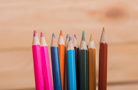 Wooden colorful pencils, on wooden tableの写真素材