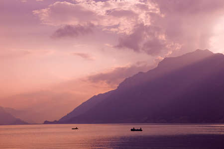 swiss lake at sunset in brienz, Switzerlandの写真素材