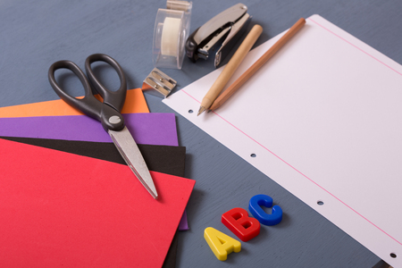 Back to school concept on a blue wooden backgroundの写真素材