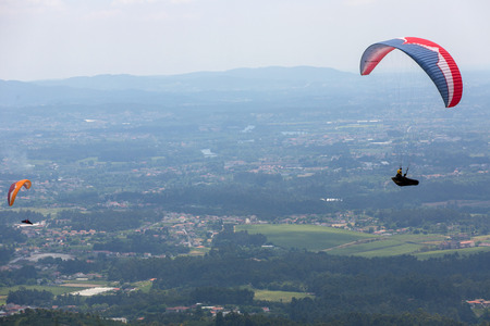 CALDELAS, PORTUGAL - JUNE 4: Paragliding Festival Aboua Cup de Caldelas 2016, in the north of Portugal, 4 June, 2016, Caldelas, Portugal.のeditorial素材