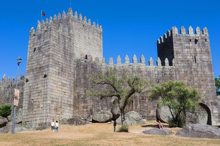 GUIMARAES, PORTUGAL: people at the Castle of Guimaraes. The principal medieval castle in Portugal. Guimaraes, Portugalのeditorial素材