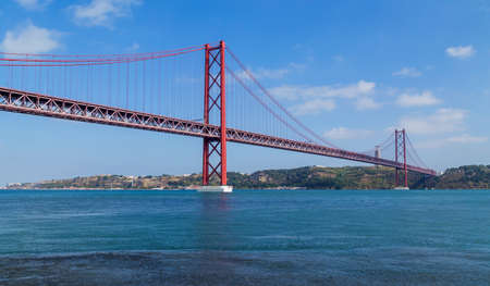 The 25 de Abril Bridge (Ponte 25 de Abril) is a suspension bridge in Lisbon over Tagus river, in...