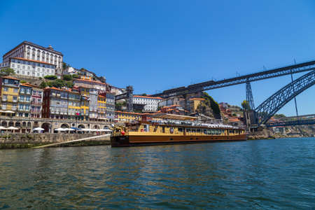 PORTO, PORTUGAL - the famous houses of the Ribeira in the Douro River bank near the Dom Luis I...