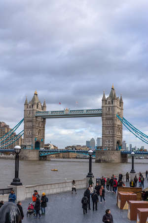 London, UK: Unidentified people around Tower bridge over the River Thamesのeditorial素材