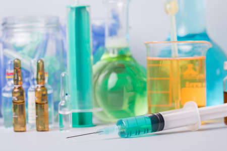 syringe with ampules of drugs