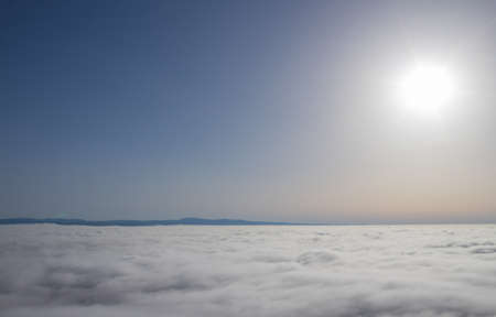 Hot air balloon in the Alentejo region, above the clouds. Portugal.