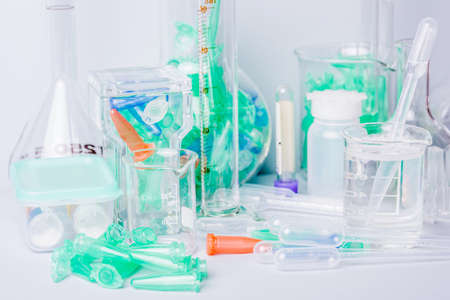 Research lab assorted glassware equipment detailの写真素材