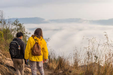 BALI, INDONESIA: Group of hikers at dawn on top of the Batur volcano in Bali, Indonesia.のeditorial素材