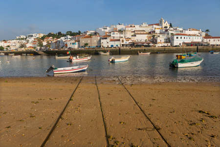 FERRAGUDO, PORTUGAL: Picturesque view of Ferragudo fishing village in Algarve, Portugalのeditorial素材