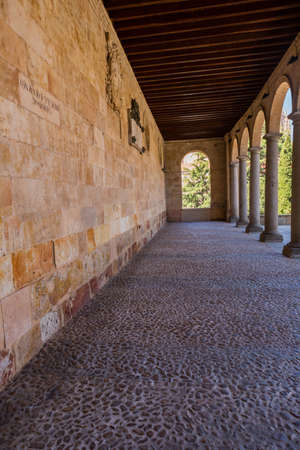 Salamanca, Spain - April, 28, 2019: Old historic cloister in the downtown of Salamanca. Plateresque XV century. The old city of Salamanca was declared a UNESCO World Heritage site in 1988.のeditorial素材
