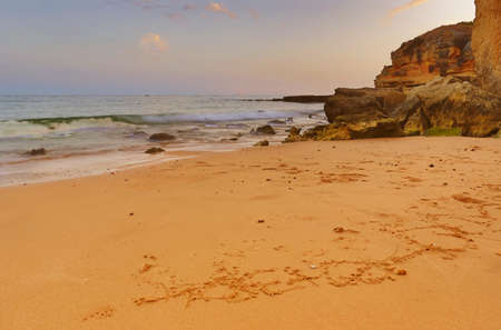 the famous beach of Olhos de Agua in Albufeira. Long exposure, Algarve, Portugal.の写真素材