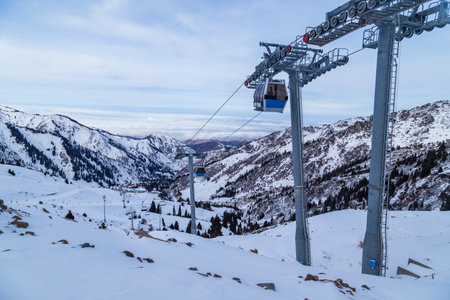 Winter Snowy Mountains with sun in Ak Bulak, Almaty, Kazakhstan, Asiaの写真素材