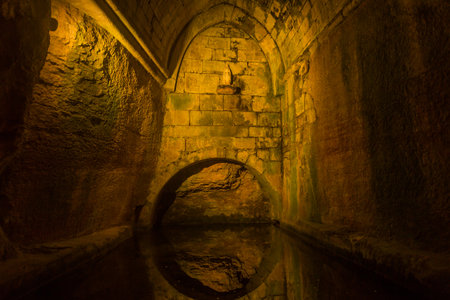 fountain at night in Sarlat la Caneda a beautiful medieval town and one of the highlights to a visit to the Dordogne Perigordの写真素材