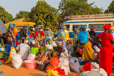 Bissau, Republic of Guinea-Bissau: Street scene in the city of Bissau with people at the street market, Guinea Bissauのeditorial素材