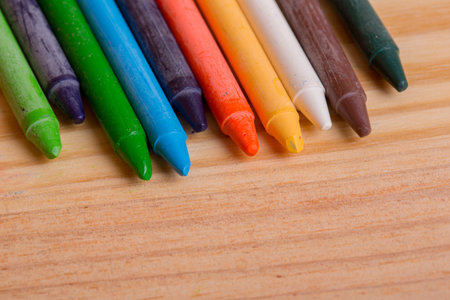 Wax crayons on a wooden backgroundの写真素材