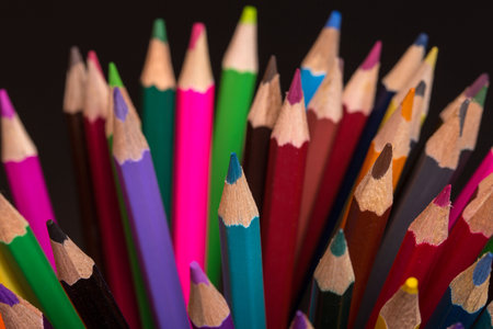 Wooden colorful pencils, on a dark backgroundの写真素材