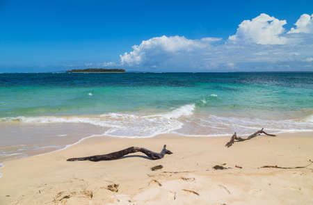 Tropical ocean beach with an island in Panama