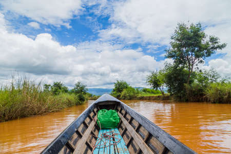 The boat in the village on the coast of Inle lake, Myanmarの写真素材