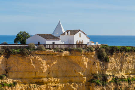 Chapel in the cliffs of Algarve, Portugalの写真素材